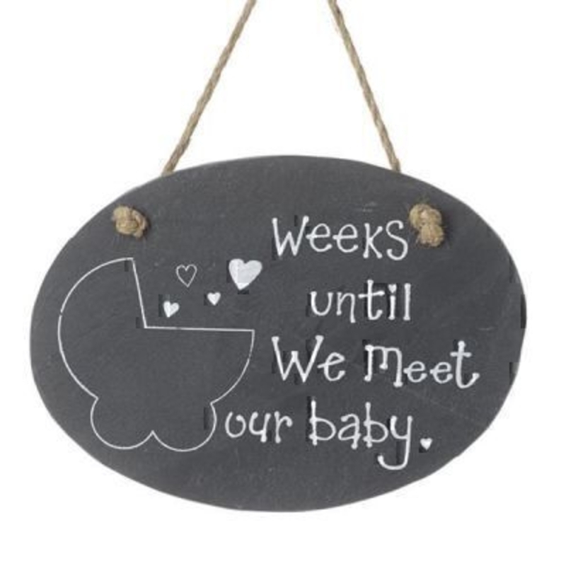 Weeks Countdown Baby by Heaven Sends. Slate Chalk board sign for you count days until a babys due date. Excellent baby shower gift for expectant parents. A picture of a pram on the front is where the weeks are written and the words ''Weeks until we meet our baby'' Size 19x13cm